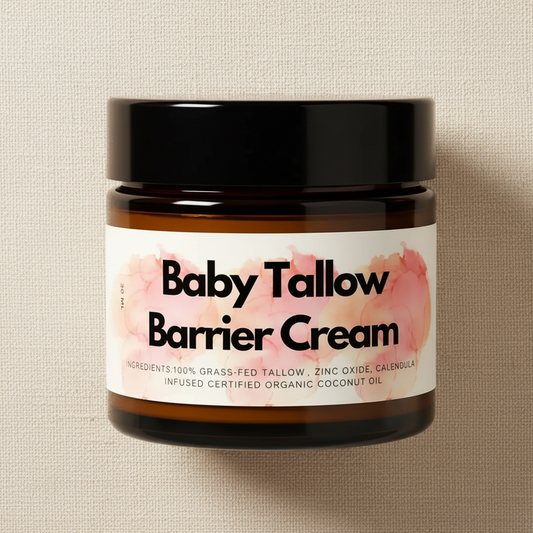 Jar of Baby Tallow Barrier Cream with a black lid on a pink background
